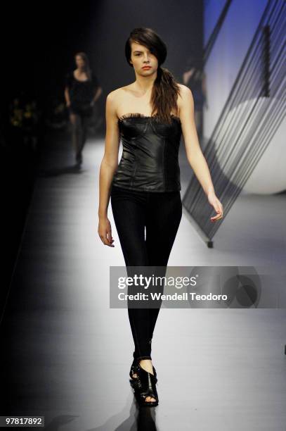 Model showcases designs on the catwalk by Bettina Liano as part of L'Oreal Paris Runway 5 on the fourth day of the 2010 L'Oreal Melbourne Fashion...