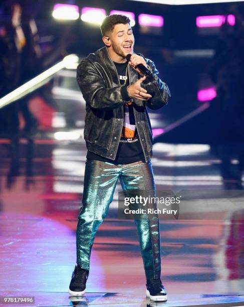 Singer/actor Nick Jonas performs onstage during the 2018 MTV Movie And TV Awards at Barker Hangar on June 16, 2018 in Santa Monica, California.