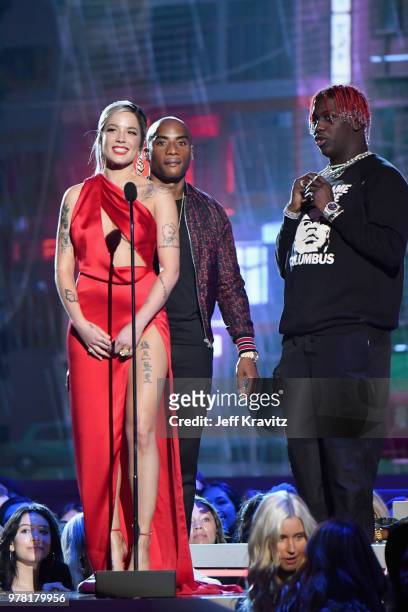 Radio personality Charlamagne Tha God , and recording artists Halsey and Lil Yachty speak onstage at the 2018 MTV Movie And TV Awards at Barker...