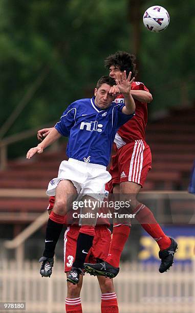Steven Dobbie of the Glasgow Rangers competes with Wayne Srhoj of Australia during the friendly between The Glasgow Rangers Under 21's and Australia...