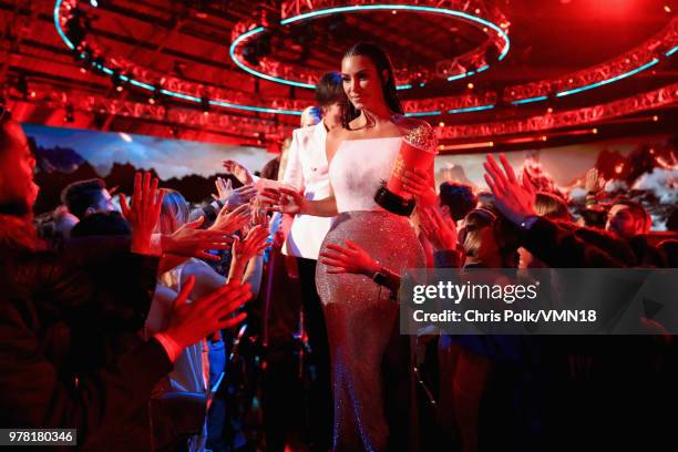 Personality Kim Kardashian, winner of the Best Reality Series/Franchise award for 'Keeping Up with the Kardashians', walks off stage during the 2018...