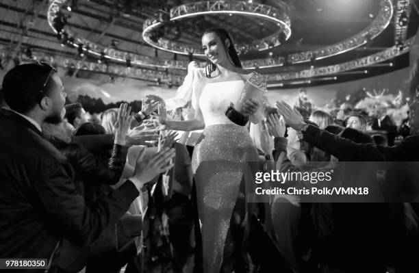 Personality Kim Kardashian, winner of the Best Reality Series/Franchise award for 'Keeping Up with the Kardashians', walks off stage during the 2018...