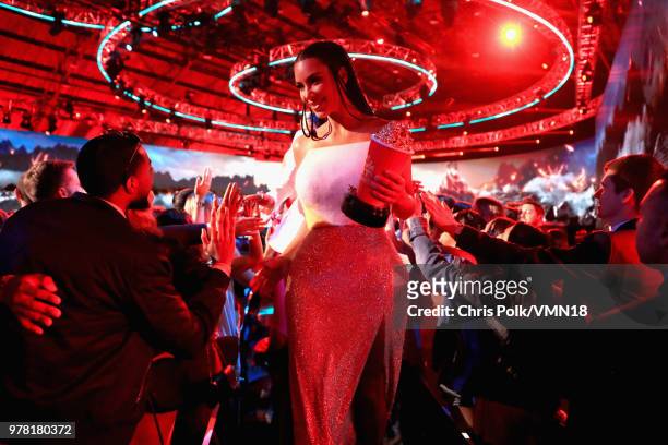 Personality Kim Kardashian, winner of the Best Reality Series/Franchise award for 'Keeping Up with the Kardashians', walks off stage during the 2018...
