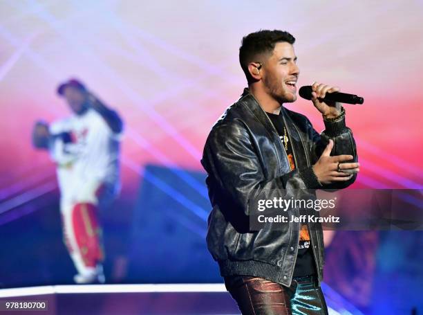 Mustard and Nick Jonas perform onstage at the 2018 MTV Movie And TV Awards at Barker Hangar on June 16, 2018 in Santa Monica, California.