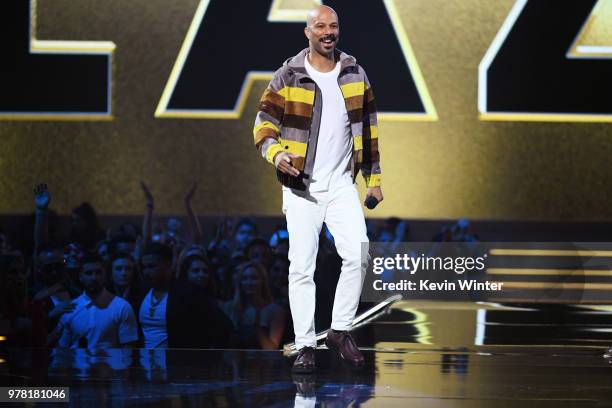 Actor-recording artist Common speaks onstage during the 2018 MTV Movie And TV Awards at Barker Hangar on June 16, 2018 in Santa Monica, California.