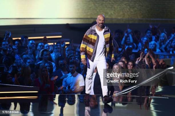 Actor/rapper Common speaks onstage during the 2018 MTV Movie And TV Awards at Barker Hangar on June 16, 2018 in Santa Monica, California.