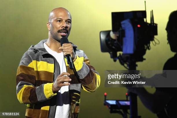 Actor-recording artist Common speaks onstage during the 2018 MTV Movie And TV Awards at Barker Hangar on June 16, 2018 in Santa Monica, California.