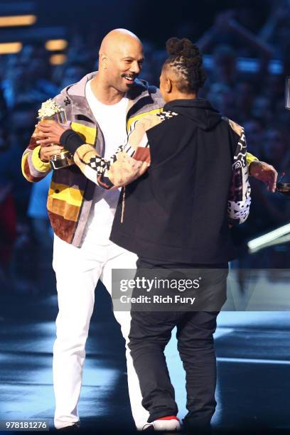 Actor/writer Lena Waithe accepts the MTV Trailblazer Award from rapper/actor Common onstage during the 2018 MTV Movie And TV Awards at Barker Hangar...