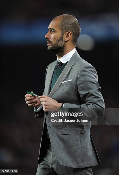 Head coach Josep Guardiola of FC Barcelona follows his players during the UEFA Champions League round of sixteen second leg match between FC...