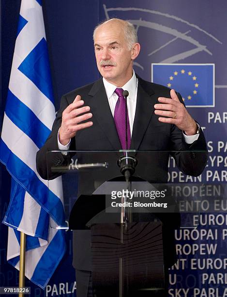 George Papandreou, Greece's prime minister,gestures during a press briefing at the European Union Parliament headquarters in Brussels, Belgium, on...