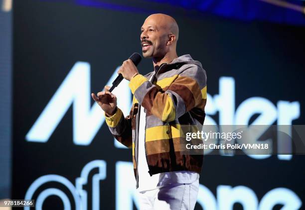 Rapper Common speaks onstage during the 2018 MTV Movie And TV Awards at Barker Hangar on June 16, 2018 in Santa Monica, California.