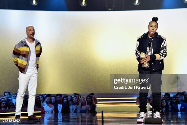Recording artist Common and Lena Waithe speak onstage at the 2018 MTV Movie And TV Awards at Barker Hangar on June 16, 2018 in Santa Monica,...