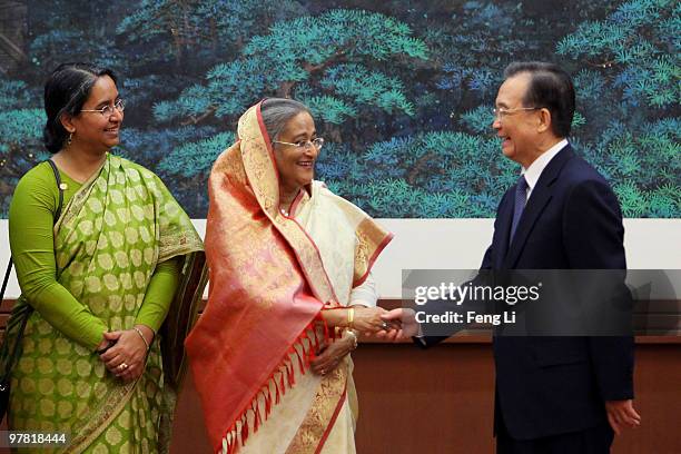 Premier of the People's Republic of Bangladesh Ms. Sheikh Hasina shakes hand with Chinese Premier Wen Jiabao during a signing ceremony in the Great...