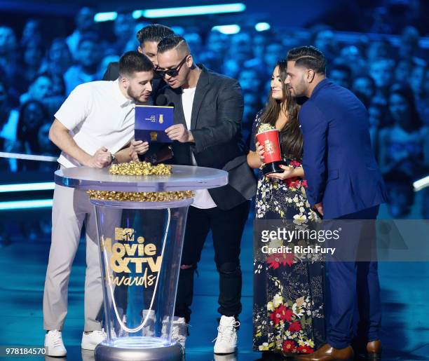 Personalities Vinny Guadagnino, DJ Pauly D, Mike Sorrentino, Deena Nicole Cortese, and Ronnie Ortiz-Magro speak onstage during the 2018 MTV Movie And...