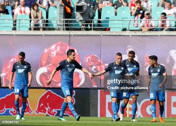 April 2018, Germany, Leipzig: Football, German Bundesliga, RB Leipzig vs 1899 Hoffenheim at the Red Bull Arena: Hoffenheim's Mark Uth , Benjamin...