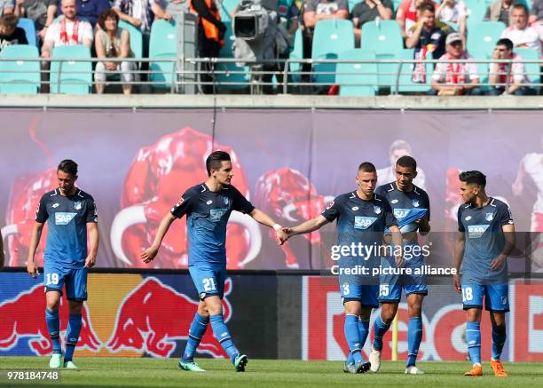 April 2018, Germany, Leipzig: Football, German Bundesliga, RB Leipzig vs 1899 Hoffenheim at the Red Bull Arena: Hoffenheim's Mark Uth , Benjamin...