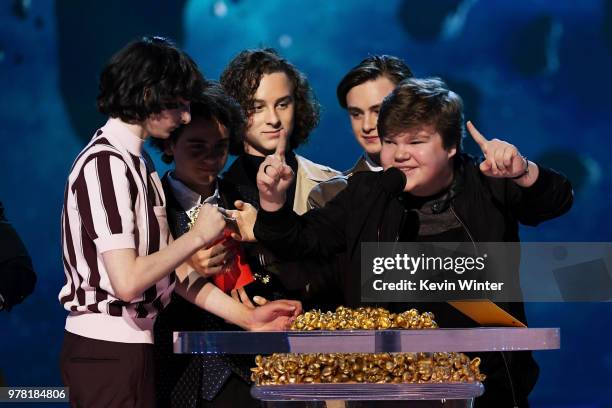 Actors Finn Wolfhard, Jack Dylan Grazer, Wyatt Oleff, Jaeden Lieberher, and Jeremy Ray Taylor accept the Best On-Screen Team award for 'It' onstage...