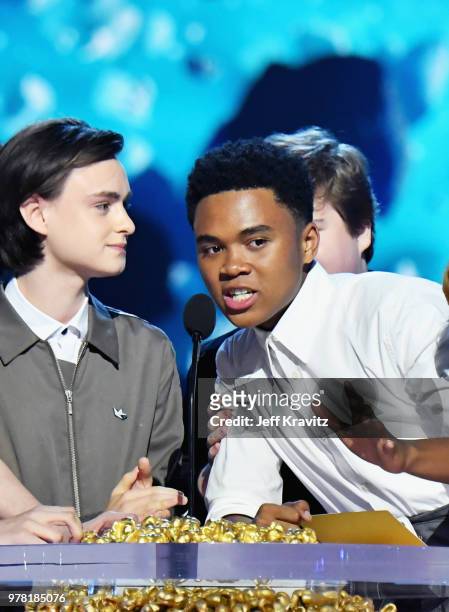 Actors Jaeden Lieberher and Chosen Jacobs accept award onstage at the 2018 MTV Movie And TV Awards at Barker Hangar on June 16, 2018 in Santa Monica,...