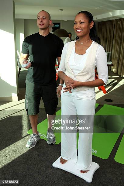 Trainer Harley Pasternak and actress Garcelle Beauvais-Nilon try out the Wii during the Wii Fit Moms event hosted by Garcelle Beauvais Nilon and...