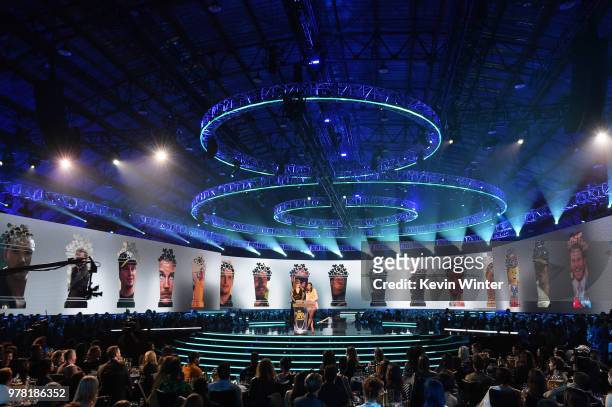 Actors Bryce Dallas Howard and Aubrey Plaza speak onstage during the 2018 MTV Movie And TV Awards at Barker Hangar on June 16, 2018 in Santa Monica,...