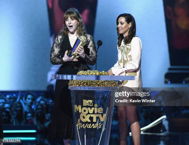 Actors Bryce Dallas Howard and Aubrey Plaza speak onstage during the 2018 MTV Movie And TV Awards at Barker Hangar on June 16, 2018 in Santa Monica,...