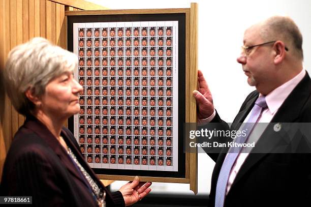 Diane Douglas and Walter Douglas the parents of Corporal Alan Douglas who was killed in Iraq looks a piece of artwork entitled 'Queen and Country'...