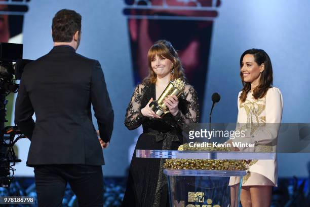 Honoree Chris Pratt accepts the MTV Generation Award from actors Bryce Dallas Howard and Aubrey Plaza onstage during the 2018 MTV Movie And TV Awards...
