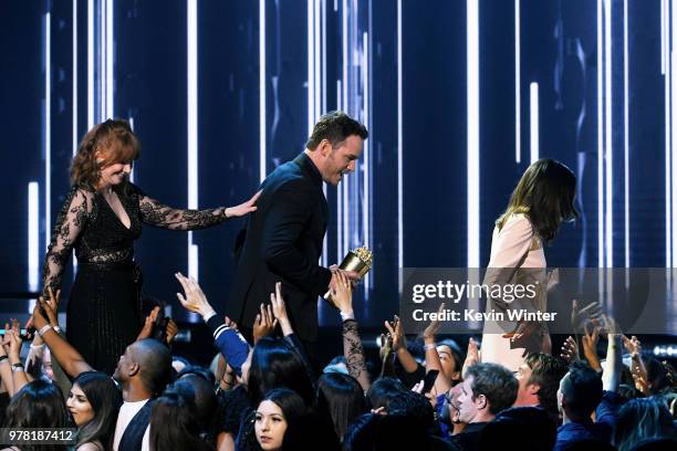 Actor Bryce Dallas Howard, honoree Chris Pratt - recipient of the MTV Generation Award - and actor Aubrey Plaza walk onstage during the 2018 MTV...