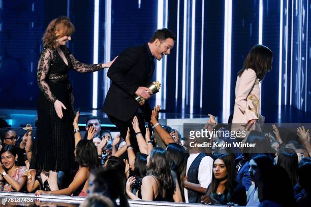 Actor Bryce Dallas Howard, honoree Chris Pratt - recipient of the MTV Generation Award - and actor Aubrey Plaza walk onstage during the 2018 MTV...