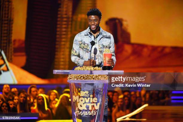 Actor Chadwick Boseman accepts the Best Performance in a Movie award for 'Black Panther' onstage during the 2018 MTV Movie And TV Awards at Barker...