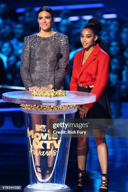 Actors Mandy Moore and Amandla Stenberg speak onstage during the 2018 MTV Movie And TV Awards at Barker Hangar on June 16, 2018 in Santa Monica,...