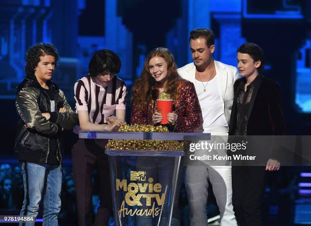 Actors Gaten Matarazzo, Finn Wolfhard, Sadie Sink, Dacre Montgomery, and Noah Schnapp accept the Best Show award for 'Stranger Things' onstage during...