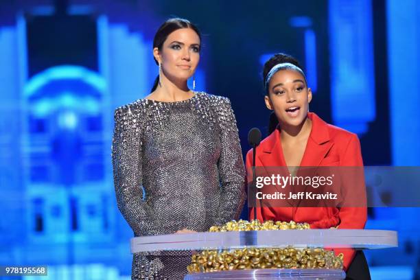 Actors Mandy Moore and Amandla Stenberg attend the 2018 MTV Movie And TV Awards at Barker Hangar on June 16, 2018 in Santa Monica, California.