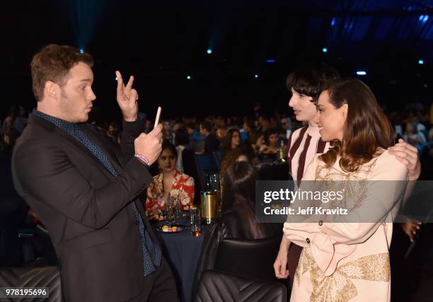 Actors Chris Patt, Finn Wolfhard, and Aubrey Plaza attend the 2018 MTV Movie And TV Awards at Barker Hangar on June 16, 2018 in Santa Monica,...