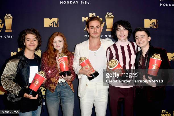 Gaten Matarazzo, Sadie Sink, Dacre Montgomery, Finn Wolfhard and Noah Schnapp pose with the Best Show award for 'Stranger Things' during the 2018 MTV...
