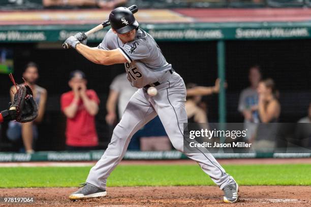 Adam Engel of the Chicago White Sox is hit by a pitch during the eighth inning against the Cleveland Indians at Progressive Field on June 18, 2018 in...