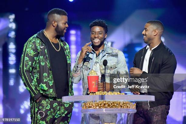 Actors Winston Duke, Chadwick Boseman, and Michael B. Jordan accept award onstage at the 2018 MTV Movie And TV Awards at Barker Hangar on June 16,...