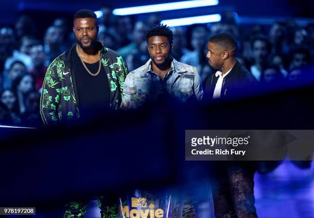 Actors Winston Duke, Chadwick Boseman and Michael B. Jordan accept the Best Movie award for 'Black Panther' onstage during the 2018 MTV Movie And TV...
