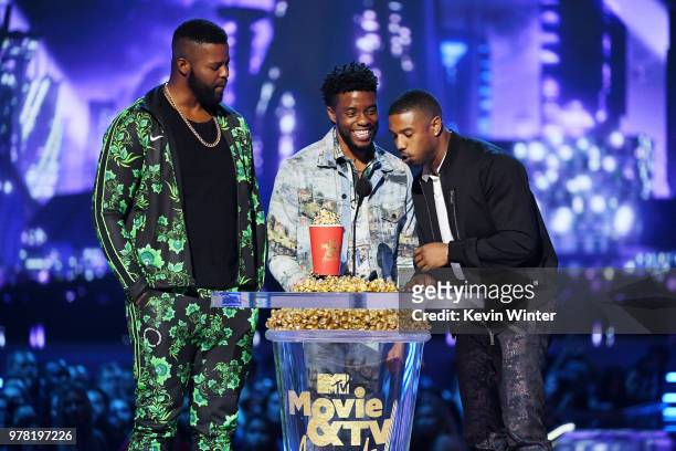 Actors Winston Duke, Chadwick Boseman, and Michael B. Jordan accept the Best Movie award for 'Black Panther' onstage during the 2018 MTV Movie And TV...