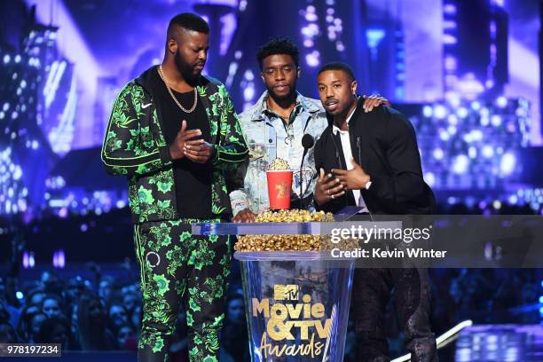 Actors Winston Duke, Chadwick Boseman, and Michael B. Jordan accept the Best Movie award for 'Black Panther' onstage during the 2018 MTV Movie And TV...