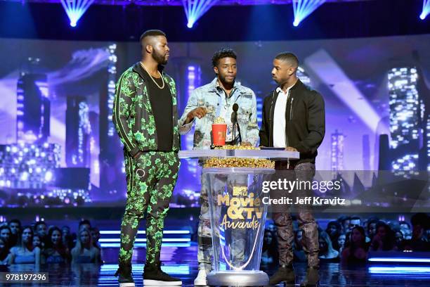 Actors Winston Duke, Chadwick Boseman, and Michael B. Jordan accept award onstage at the 2018 MTV Movie And TV Awards at Barker Hangar on June 16,...