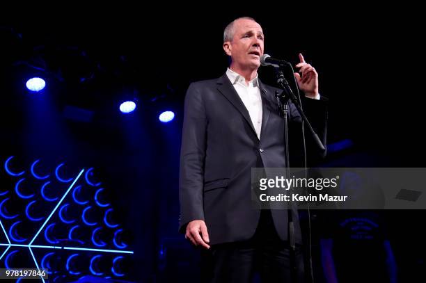 Governor of New Jersey Phil Murphy speaks onstage during the Grand Re-Opening of Asbury Lanes at Asbury Lanes on June 18, 2018 in Asbury Park, New...