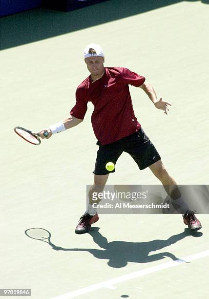 Lleyton Hewitt of Australia, the sixth seed in the men's division, hits a forehand during the final set on the Armstrong court. Hewitt defeated...