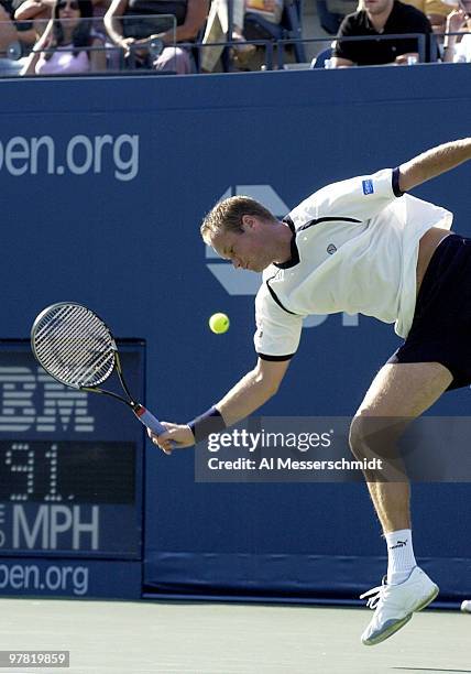Martin Verkerk of the Netherlands, the 16th seed in the men's division, lunges for a forehand on the Ashe court. Todd Martin, U. S. A., upset Verkerk...