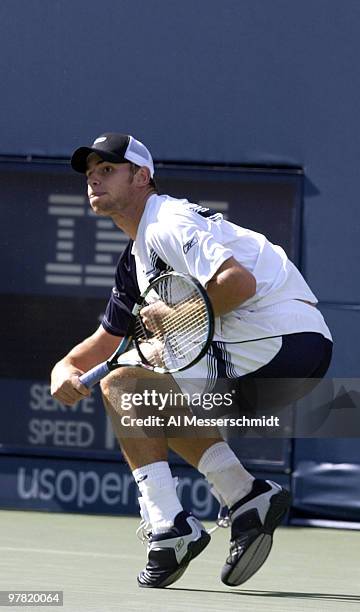 Andy Roddick, U. S. A., the fourth seed in the men's division, tip toes for a shot Sunday, August 31, 2003 at the U. S. Open in New York. Roddick...