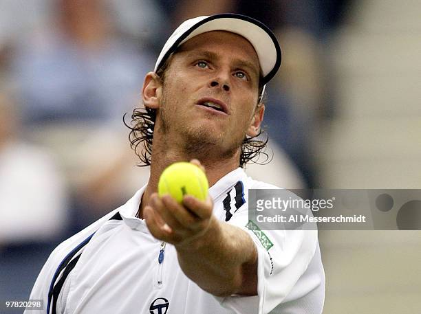 David Nalbandian of Argentina sets to serve Thursday, September 4, 2003 at the U. S. Open in New York. Federer, the second seed from Switzerland, was...