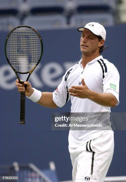 David Nalbandian of Argentina questions a c all on the Arthur Ashe court Thursday, September 4, 2003 at the U. S. Open in New York. Federer, the...