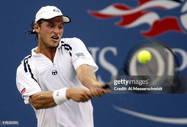 David Nalbandian of Argentina sets for a backhand Thursday, September 4, 2003 at the U. S. Open in New York. Federer, the second seed from...