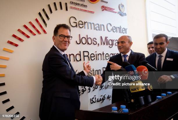 April 2018, Erbil, Iraq: Gerd Müller , Minister of Development, opens a migration advisory center with Ali Sindi, Minister of Planning. Müller holds...
