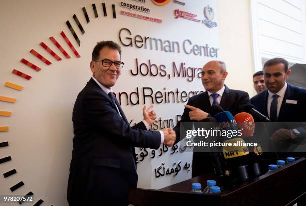 Dpatop - German Development Minister, Gerd Mueller opens a migration advisory center, with Iraqi Minister of Planning Ali Sindi, in Baghdad, Iraq, 22...